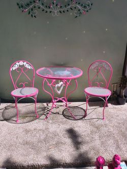 Pink outdoor porch patio table and chair furniture