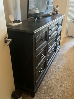Large Black Wood Dresser with Multiple Drawers