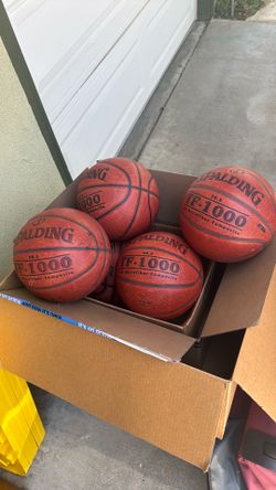 Five Spalding  basketballs