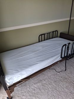 Electric hospital bed + mattress + half rails