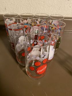 Vintage coke glasses and one cardinal mug