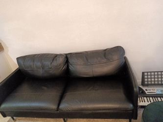 Black faux leather couch