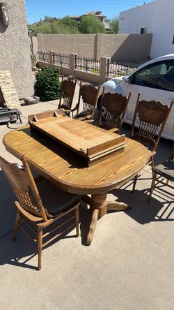 Table with two leaves and 6 chairs