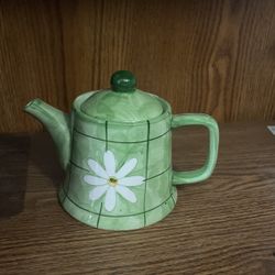 Tea Pot . Danaged inside rim. Can use as decoration or small plant