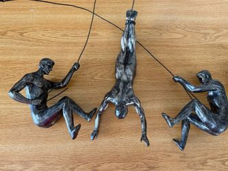 Climbing Man Wall Sculpture Set | Resin Art Design | Distinctive Wall Decor for Living Rooms and Offices. 10”-12” long. I have two sets of three. Each