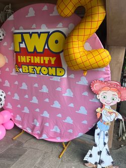 Toy Story themed arch, cloth and stand