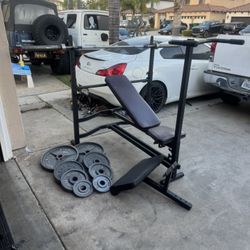 Bench press with 7ft 45lbs bar and 220lbs of Olympic weights