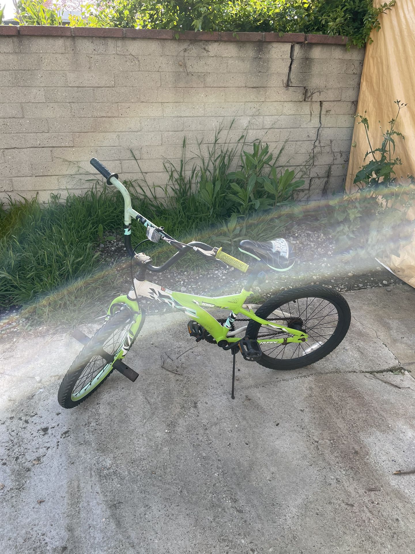 Green bike, for child.