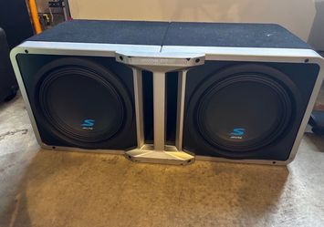 Two 10-inch Alpine Speakers and Kicker Amp