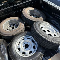 4 stock ford rims and michelin tires