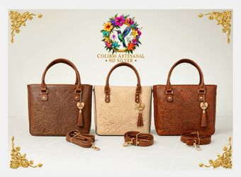 Bolso Artesanal de piel grabada.