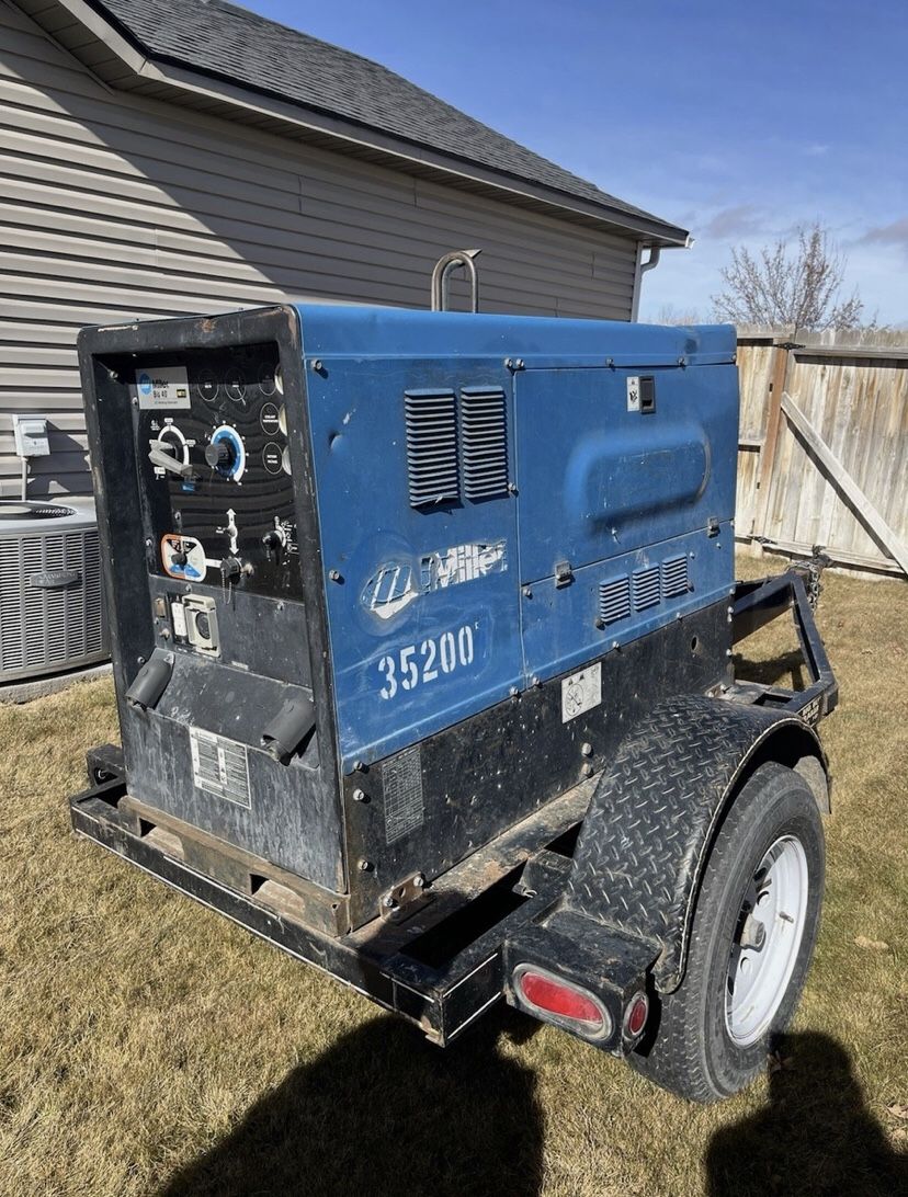 Big Blue Miller Bobcat Generator 