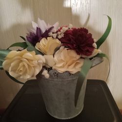 Beautiful Flower Arrangement In Tin Vase