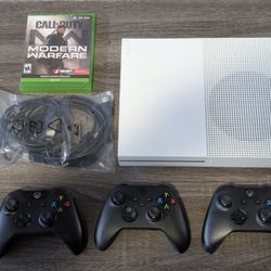 Xbox One S - Excellent Condition  Includes HDMI cable, power cable, 3 controllers, and 1 game (COD MW).
