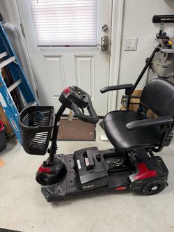 Scoot  4 wheel scooter