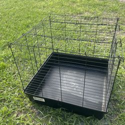 Cage for rabbit or for whatever you want to use it 23x23 in good condition 