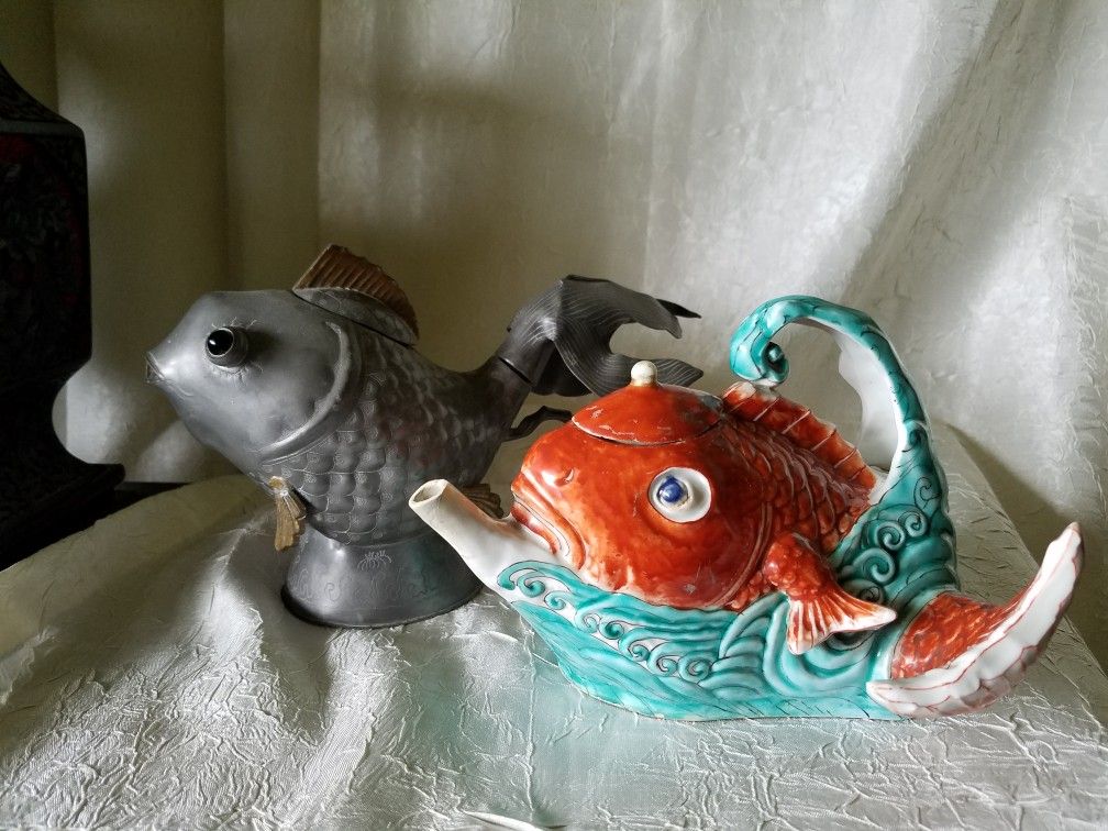 Two Golden Fish Teapots