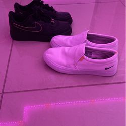 2 pairs of shoes (Nikes) 
