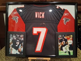 MICHAEL VICK WITH THE ATLANTA FALCONS ,BRANDED AUTHENTIC FRAMED JERSEY.