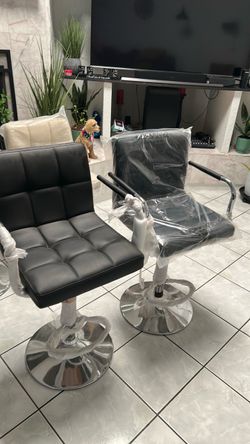 New swivel adjustable stools with arms  150.00