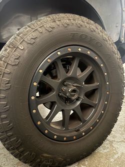 Set of 5 35” x 12.5 Toyo open country extreme tires with Walker Evan’s 504 Legacy Satin Black wheels jeep