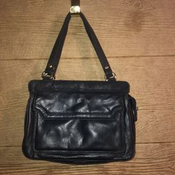 Vintage navy leather purse with several compartments. In great condition