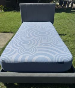 Beutiful twin bed complete with good mattress