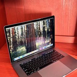 Apple MacBook Pro 15” Retina, Touch Bar, I7, 16GB RAM 256GB SSD macOS 15.1 Sequoia $500