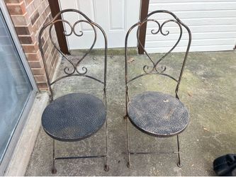 Free two patio metal chairs