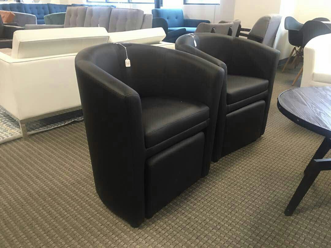 Set of 2 black leather chair and ottoman