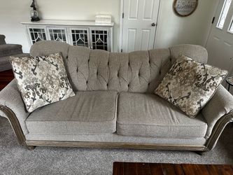 Sofa with Wood Trim and Throw Pillows