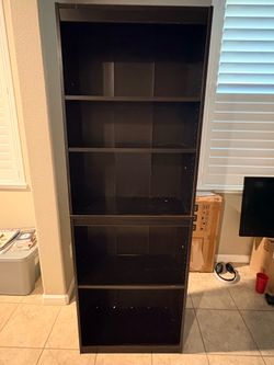 Brown tall bookshelf