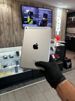 Apple iPad Mini 4th Gen 128 GB WiFi + Cellular (Unlocked) + Warranty