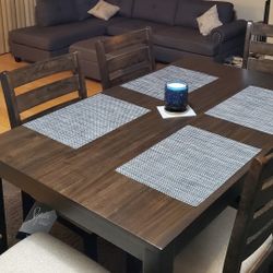 Couches And Table With Chairs