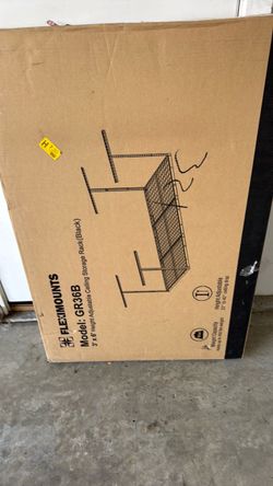 Height adjustable ceiling storage rack