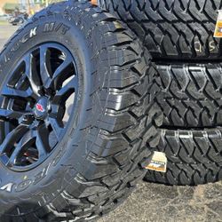 18 INCH SILVERADO 6X139 WHEELS AND TIRES 35X12.50R18 LT TAMAROCK MT GLOSS BLACK $1400  INSTALLED 