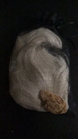 A short blonde curly wig