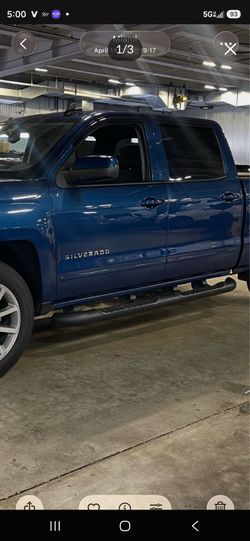 Side steps for a Chevrolet Silverado 1500