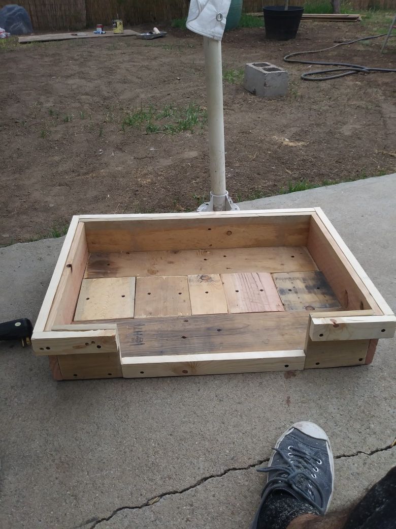Small dog bed made of repurposed pallet wood