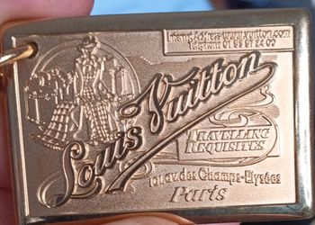 Louis Vuitton “Traveling Requisites” Gold Keychain / Bag Charm M65374 – New with Dust Bag