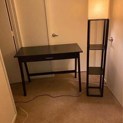 Black desk and a black lamp