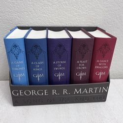 George R. R. Martin's A Game of Thrones Leather-Cloth Boxed Set (Song of Ice and Fire Series): A Game of Thrones, A Clash of Kings, A Storm of Swords,