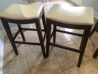 Two leather barstools $50