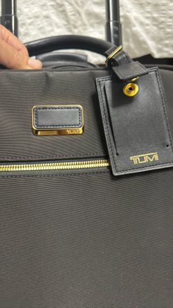 TUMI 16”.