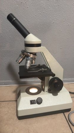 Compound Monocular Microscope with Built-In Light