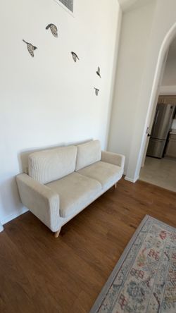 Beige colored couch