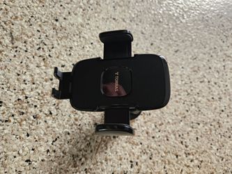 Car dashboard phone holder