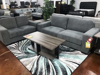 Grey fabric sofa and loveseat