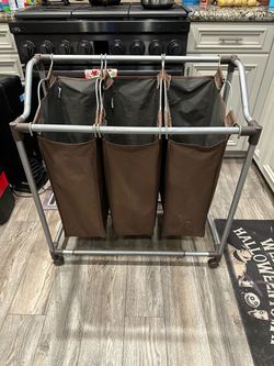 Three Compartment Laundry Hamper With Wheels