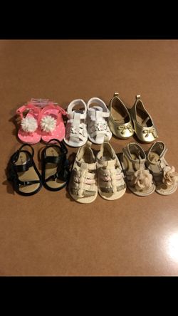 Gently used or never used shoes, size 2 diapers (273ct.), 0-3month onesies, 2 bouncers... (can purchase separately) (diapers sold)